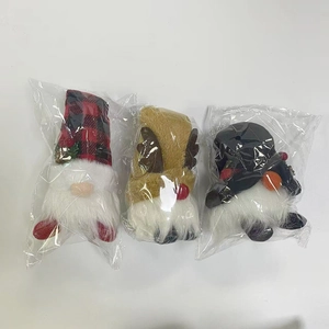 Three-piece set of plush Christmas gnomes featuring plaid hats and reindeer antlers