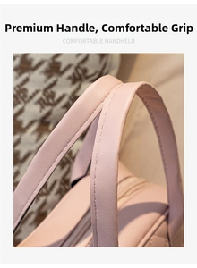 Détail macro de la poignée en cuir rose confortable avec des coutures de qualité