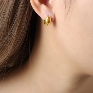 Polished gold teardrop stud earrings for women with minimalist water drop design