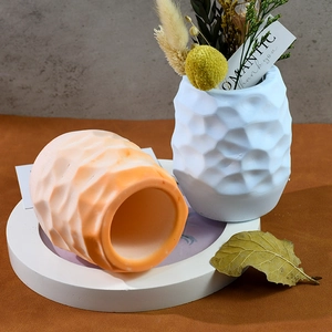 Close-up of geometric honeycomb silicone mold for DIY resin flower vases and pen holders