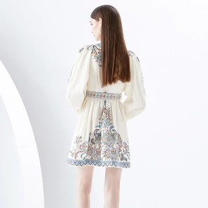 Boho chic mini dress with V-neck lantern sleeves and vintage floral paisley print
