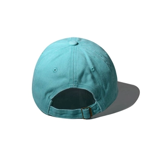 Detail view of the mint blue baseball cap showing a bronze metal buckle and cotton fabric