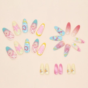 Detail of press-on nails with summer fruit, checkerboard, and 3D floral beach patterns