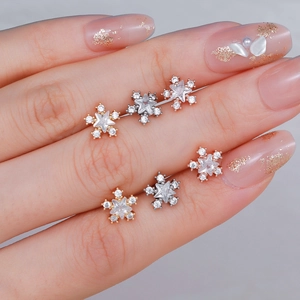 Set de pendientes de estrella y copo de nieve en oro, plata y oro rosa inoxidable