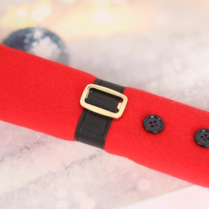 Christmas refrigerator handle cover with red felt design and festive black belt buckle