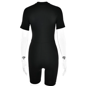 Rear view of black short sleeve slim fit bodysuit with elastic fabric on model