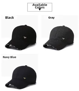 Detail view of winter baseball caps in black, grey, and navy blue with metal logo and ear flaps