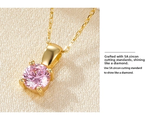 Macro detail of gold S925 silver necklace with 5A pink zircon in claw setting