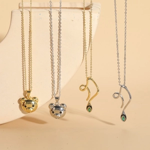Cute bear and snake design pendants in gold and silver finish on sleek necklaces