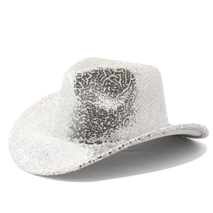 Macro view of sparkly silver sequins on wide brim cowboy hat for festive party