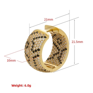 Detailed view of leopard print hoop earrings with white and black zircon stones and size specs