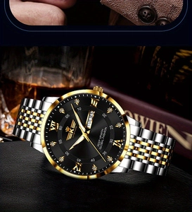 Detail of luxury dual-tone steel watch with black diamond dial and date display