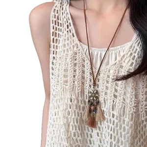 Bohemian vintage flower pendant necklace with wood beads and long brown fringe tassels