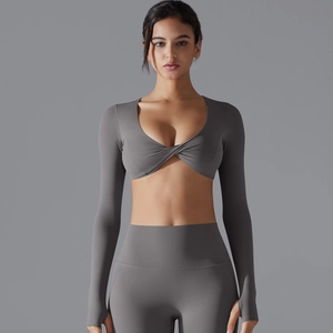Set da yoga grigio scuro con top a maniche lunghe e leggings a vita alta