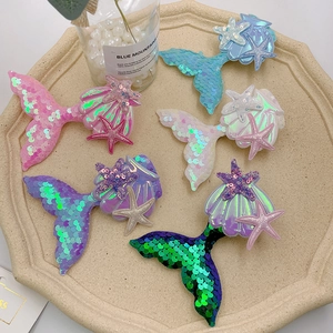 Detailed set of 5 sequined mermaid and shell hair clips in pastel gradient colors