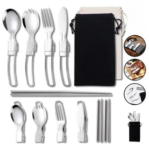 Macro detail of portable folding stainless steel cutlery set with storage pouches