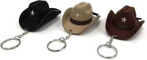 Three mini felt cowboy hat keychains in black, beige, and brown with star badges