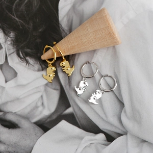 Detailed close-up of S925 sterling silver dinosaur hoop earrings in gold and silver finish