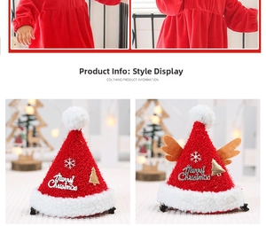 Detail of Christmas hair clips featuring mini red Santa hats with antlers and plush trim