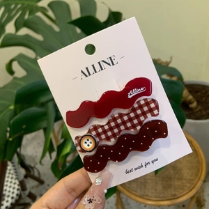 Three-piece set of wave-shaped red plaid and polka dot hair clips for styling