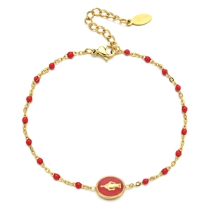 Detail of gold stainless steel bracelet with red beads and Virgin Mary enamel charm