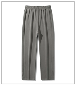 Detail view of light grey straight-leg men's casual sweatpants with elastic waistband