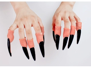Close-up of realistic long black witch finger claws for Halloween cosplay costume