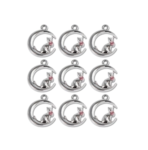 Présentation de neuf pendentifs chat lune argentés avec strass roses pour bijoux DIY