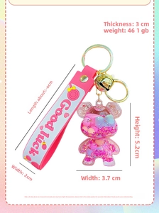 Detailed view of liquid bear keychain with pink sequins and dimensions in centimeters