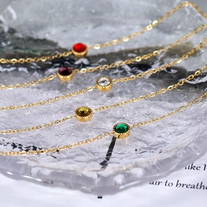 18K gold plated necklace and bracelet set featuring multi-color round cut crystal pendants
