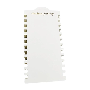 White cardboard jewelry display card with 12 slots and Fashion Jewelry gold lettering