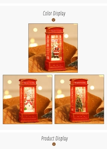 Detailed view of red Christmas telephone booth lamps with Santa and Snowman inside