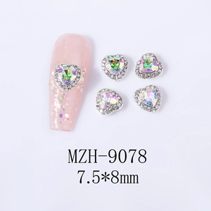 Macro detail of 7.5*8mm aurora heart nail rhinestones with silver alloy base