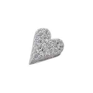 Detailed view of silver heart-shaped bead with micro-pave zircons for DIY jewelry