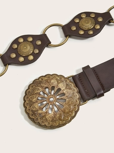 Retro wide dark brown leather belt featuring large carved metal buckle and rivet details