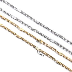 Detail view of 2mm and 1.45mm stainless steel chains in gold and silver finish