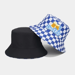 Detail of blue checkerboard and black cotton bucket hats with Cheers beer embroidery