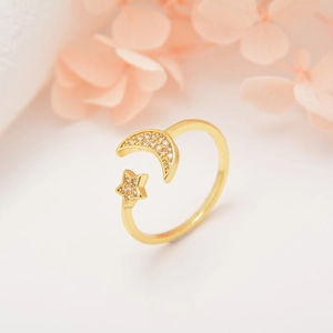 Elegant gold-plated open ring featuring cubic zirconia crescent moon and star motifs