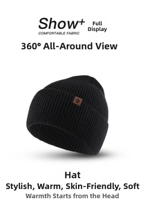 Detail of black ribbed knit beanie featuring a brown leather snowflake patch accent