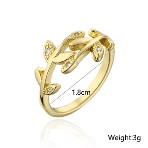 Detail shot of 18K gold leaf ring showing 1.8cm diameter and 3g weight measurements
