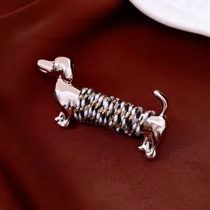 Luxury silver dachshund dog brooch with colorful braided rope detail for suits