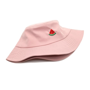 Close-up of pink cotton bucket hat featuring detailed watermelon slice embroidery