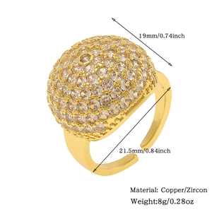Detail view of a gold-plated adjustable ring with a pave-set zircon dome and size dimensions