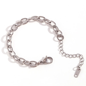 Close-up of silver stainless steel cable chain bracelet with lobster clasp and extender