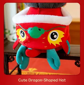 Close-up of festive red dragon-shaped plush hat with soft cartoon eyes and fur trim