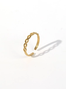 Detail of 18k gold plated stainless steel twisted rope texture on an open ring