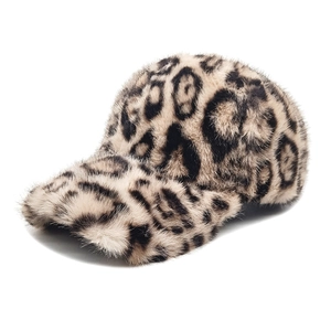 Close-up of plush leopard print baseball cap featuring soft faux fur texture and warm fabric