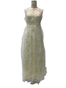 Close-up of elegant V-neck bridal dress with delicate floral lace and sequins