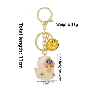 Detailed size specifications for the cute Siamese cat keychain showing height and weight