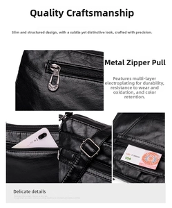 Détail du sac bandoulière en cuir grainé noir avec fermeture éclair multicouche durable
